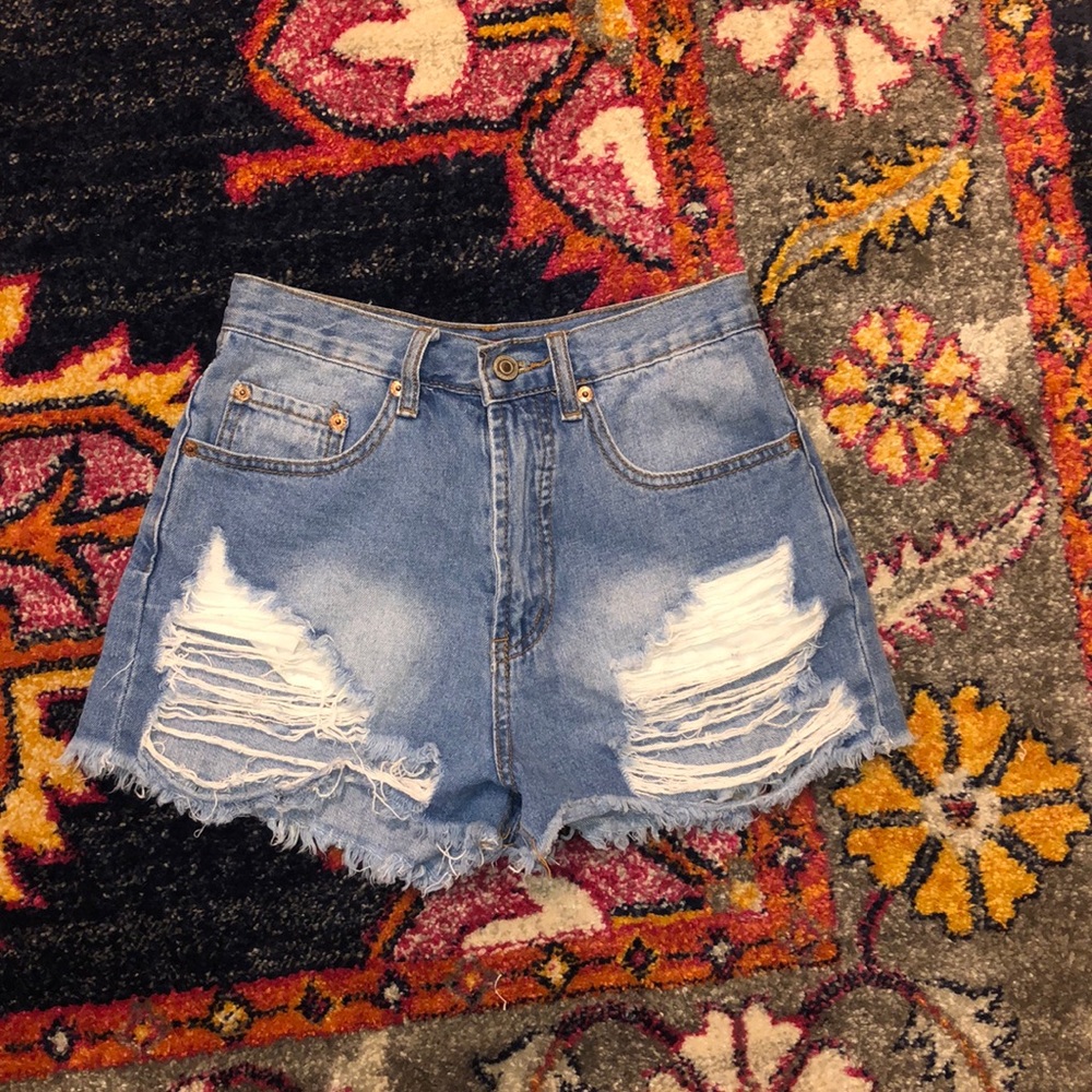 High Waisted Destroyed style medium wash shorts